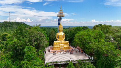 Buriram's Pride. Phra Suphattharabophit and the Stunning Landscape of Khao Kradong, buddha statue in thailand.