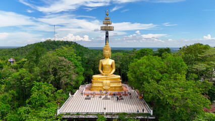 Buriram's Pride. Phra Suphattharabophit and the Stunning Landscape of Khao Kradong, buddha statue in thailand.