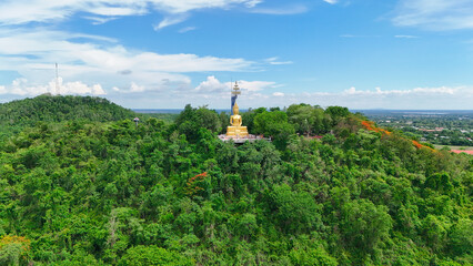 Buriram's Pride. Phra Suphattharabophit and the Stunning Landscape of Khao Kradong, buddha statue in thailand.