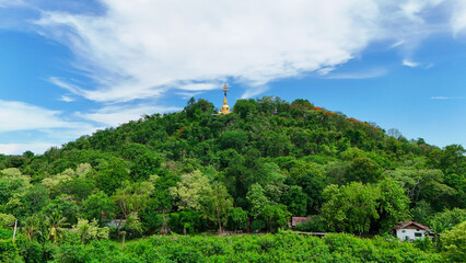 Buriram's Pride. Phra Suphattharabophit and the Stunning Landscape of Khao Kradong, buddha statue in thailand.