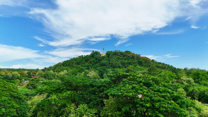 Buriram's Pride. Phra Suphattharabophit and the Stunning Landscape of Khao Kradong, buddha statue in thailand.