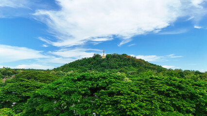 Buriram's Pride. Phra Suphattharabophit and the Stunning Landscape of Khao Kradong, buddha statue in thailand.