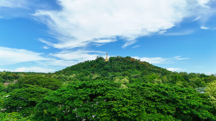 Buriram's Pride. Phra Suphattharabophit and the Stunning Landscape of Khao Kradong, buddha statue in thailand.