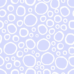 Seamless abstract pattern with uneven hand-drawn circles in light purple tones. Flat vector background with irregular bubble-like shapes.