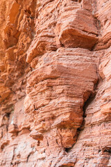 Red rock formations a close-up of the bizarre structure in reserve Altschlossfelsen in the Saarland region of Germany the stones have a bright red and orange color and abstract form