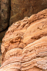 Red rock formations a close-up of the bizarre structure in reserve Altschlossfelsen in the Saarland region of Germany the stones have a bright red and orange color and abstract form