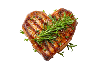 A top-down photograph of a grilled steak in the shape of a heart, isolated on a transparent background with a rosemary leaf.