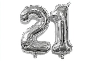 Shiny silver number twenty-one foil balloons on a white background, perfect for celebrating a milestone birthday, anniversary or other special occasion, close up view.