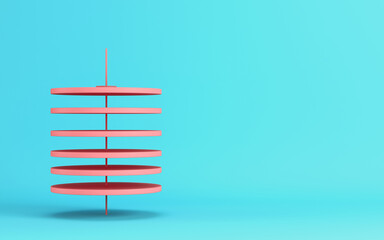 Abstract spinning discs on cyan background in pastel colors. Minimalism concept