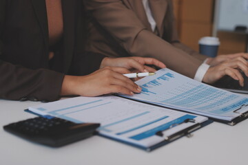 Accounting company provide finance and taxation planning for profitable cash flow, Auditor and accountant team working in office, analyze financial data and accounting record with calculator.Insight