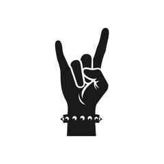 Obraz premium Rock On Hand Gesture Silhouette Vector Raised Fist with Studded Bracelet Black Icon for Music Festivals Concerts and Heavy Metal or Punk Rock Themes Isolated Design Element for Tshirts and Posters