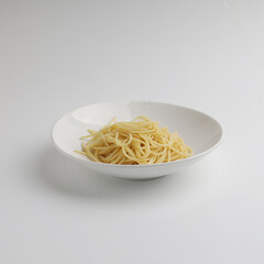 Spaghetti with mushroom sauce in a plate