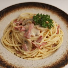 Spaghetti with mushroom sauce in a plate