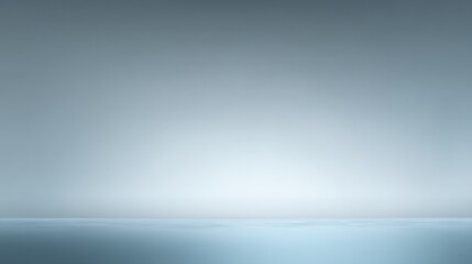 Plain minimalist background transitioning from cool blue to foggy gray, ideal for copy space.