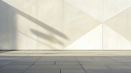 Abstract geometric patterns on a white wall, embodying minimalism and modern elegance.
