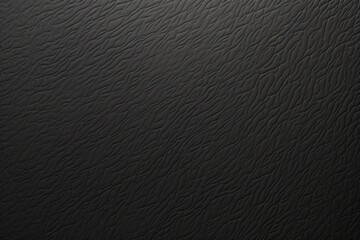 Detailed view of textured black material with unique patterns and lines for artistic or design applications
