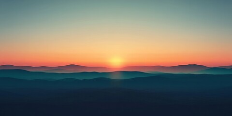 Obraz premium Beautiful sunrise over rolling mountains with soft pastel colors lighting the sky and valleys
