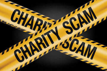 Yellow caution tape with black stripes and text "Charity Scam" crossed over black background, warning against fraudulent charities