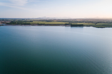 Serene Lake Landscape with Rolling Hills