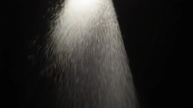 Abstract lighting, dust, particle and glare on a dark background