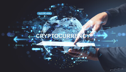 Hands using tablet with glowing cryptocurrency data and blockchain network over abstract digital globe on dark background in business concept..