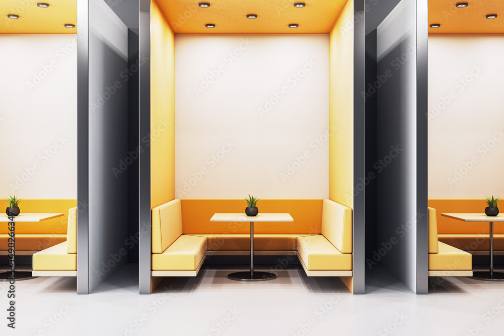 Poster modern indoor booth seating area with yellow padded benches and small tables in a minimal architectu