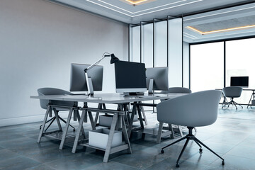 Modern office interior with empty workstations, stylish chairs and sleek lighting on a bright background with nobody present. 3D Rendering