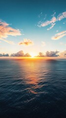 Obraz premium Sunset reflection over calm ocean waters coastal landscape nature photography serene environment wide-angle view