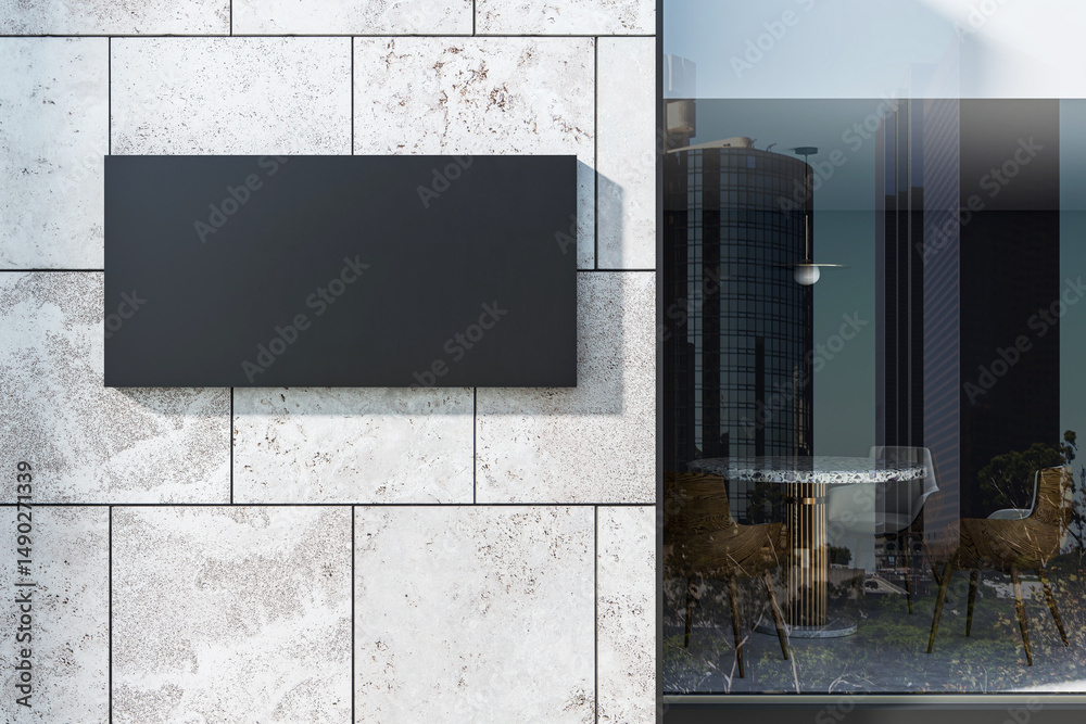 Poster modern blank black rectangular signage on luxury stone facade with glass window reflecting cityscape