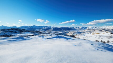Fototapeta premium Snowy mountain landscape adventure rocky mountains aerial view clear sky nature's beauty