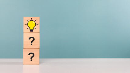 Creative, creative thinking ,idea, problem solving, innovation. Wooden cube with light bulb symbol indicates the process of thinking, inspiration, idea