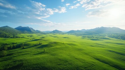 Fototapeta premium Breathtaking nature landscape rolling green hills aerial view serene environment vibrant scenery