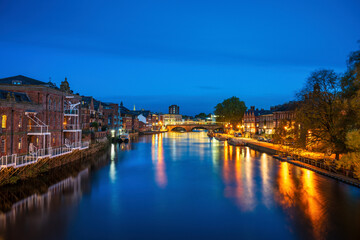 York cityscape seen across river Ouse at dusk. England 