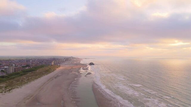 Aerial Sunset Flyover Along the Coast Towards Blankenberge Pier | FlyLens 4K