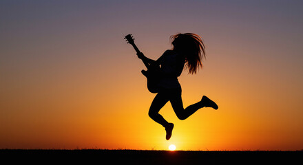 Silhouette of Girl Playing Electric Guitar at Sunset