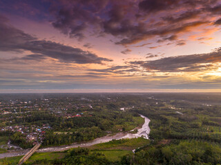 Fototapeta premium beautiful morning view panorama of indonesia agriculture industry rice fields with beautiful sky colors natural light
