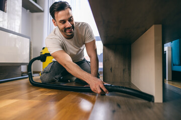 Man Vacuuming