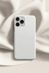 Minimalist White Phone Case on Soft Fabric Surface for Modern Aesthetic