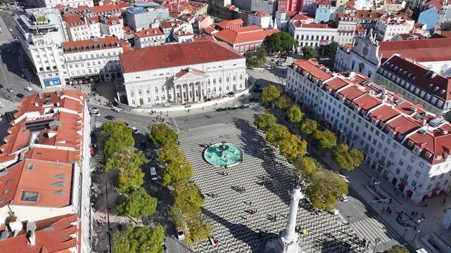 Dom Pedro Iv Square At Lisbon District Of Lisbon Portugal. Aerial View Of A City Park Surrounded By Busy Streets And Buildings. Metropole Landscape Skyscrapers Vibrant. Metropole Corporate Town.