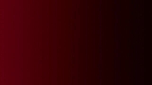 Red color warning or attention alarm alert emergency light flickering or blinking effect. Blurred grainy texture abstract background. Damage, horror, error and confusion concept.