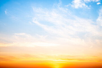 Beautiful , luxury soft gradient orange gold clouds and sunlight on the blue sky perfect for the background, take in evening,Twilight, Large size, high definition landscape photo