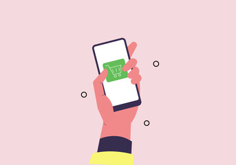 Hand holds a smart mobile phone displaying a Shopping concept on its digital touch screen