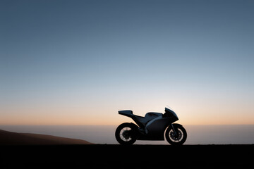 Fototapeta premium sleek silhouette of racing motorcycle against dramatic evening horizon emphasizing elegant lines and curves of bike