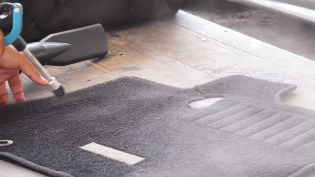 The professional car carpet cleaning process in action ensuring a spotless and fresh appearance