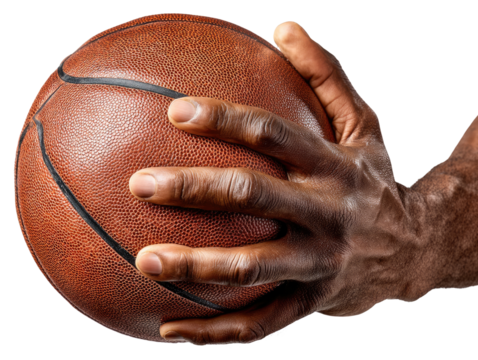 Gripping the Game: A strong hand firmly clutches a textured basketball, poised and ready for action, highlighting the focus and commitment to the game.