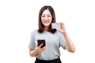 Asian young beautiful woman holding a smartphone and a credit card, smiling confidently.
