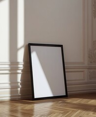 Blank Black Frame Mockup Against A White Wall With Sunlight Shadows
