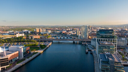 Aerial view on Lagan River and buildings in City centre of Belfast Northern Ireland. Drone photo, high angle view of town