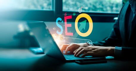 SEO Strategy for Online Business Marketing, Professional Working on Laptop with SEO Letters, Search...