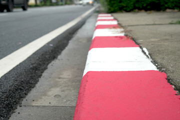 Red traffic lines prohibit parking.